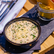 Hot Crab Laverbread Dip [Serves 2] Dragon Cheddar cheese, cream cheese, crab meat & Worcestershire sauce, finished with a pinch of Halen Môn smoked sea salt. Servedwith chilli & ginger Cradoc’s crackers.