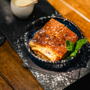 Welsh Cake Bread & Butter Pudding Welsh Cake Bread & Butter Pudding - Slices of Welsh cake with rich dark chocolate, baked in a vanilla custard.
